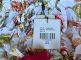 a label on a shirt that is hanging from a hanger