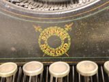 a close up of a typewriter with many buttons on it