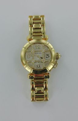 CARTIER, Pacha. Montre or, avec sa grille pavée de diamants …