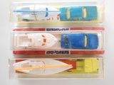 four different types of toy boats in the package