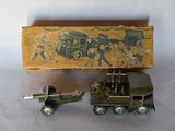 a toy truck with a box on the back of it