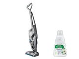 un gros plan sur un aspirateur et un flacon de produit nettoyant
