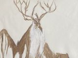 un tableau représentant un cerf et un chien posé sur une table