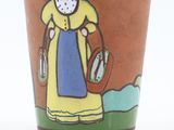 a cup with a picture of a woman on it