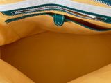 a close up of a purse with a zipper on it