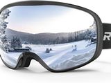 des lunettes de ski avec, en arrière-plan, l'image d'une station de ski