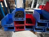 many bins that are sitting on a table