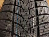 a close up of a tire with a blue line on it