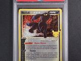 a close up of a pokemon card on a black surface