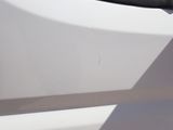 a close up of a car ' s door handle and handlebar