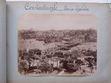 an old photo of a view of a city from the top of a hill