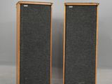 a pair of speakers sitting next to each other on top of a table