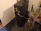 a computer and a keyboard on the floor in a room
