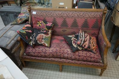an image of a couch in a room with a lot of furniture