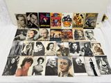 an image of a collection of old movie posters on a bed