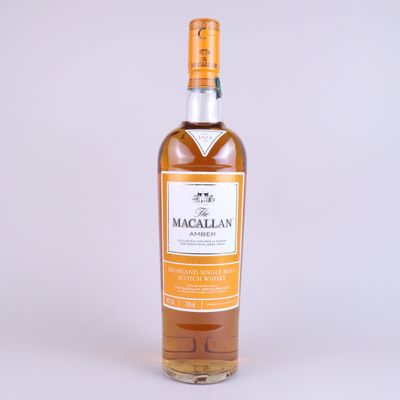 a bottle of macallan single malt whisky on a white background