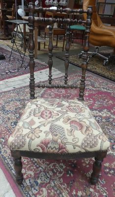 a chair that is sitting on a rug on the floor