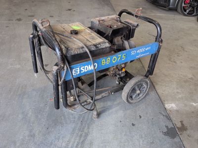 an image of a cart with a sign on it in a garage