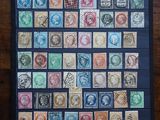 a picture of a picture of a collection of stamps on a table
