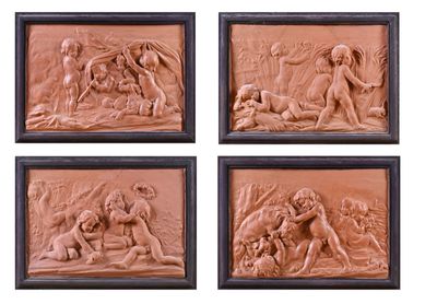 four reliefs of nudes in a wood frame on a white background