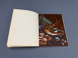 un livre ouvert sur lequel figure l'image d'un poisson