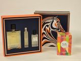 an image of a couple of perfume bottles in a box