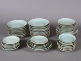 a lot of plates stacked on top of each other