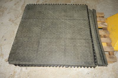 a close up of a sheet of cement on a pallet