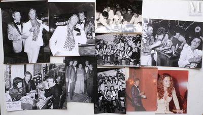 several black and white photos of people and their families on a refrigerator