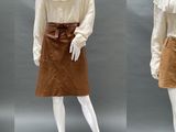 three mannequins dressed in different styles of clothing on mannequins