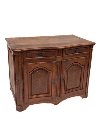 Buffet bas en chêne mouluré et sculpté ouvrant par deux vant… - Photo 1