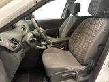 the interior of a car with two seats and a steering wheel