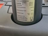 the back of a parking meter with a sticker on it ' s side