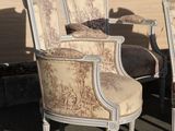 pair of antique french style chairs with upholstered back cushions