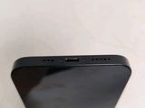 the back of a black iphone with a white apple logo on it