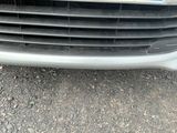 a close up of a front bumper of a car