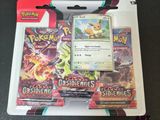 gros plan d'une boîte de cartes pokemon sur une table