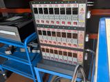 a machine that is sitting on a cart in a warehouse