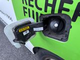 a gas pump that is attached to the side of a truck