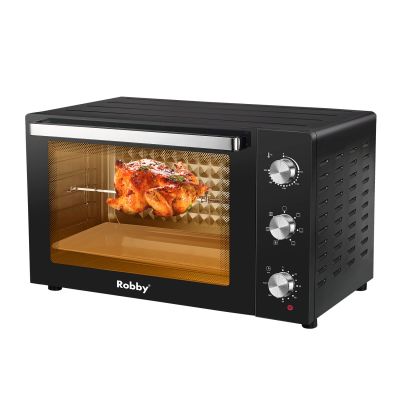 une photo d'un four grille-pain contenant un poulet