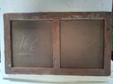 a picture of an old window with some writing on it