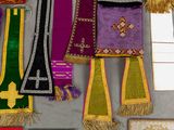 many different types of cloths laid out on a table