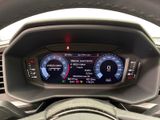 the dashboard of a car with a digital display on it