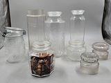 many jars and jars that are sitting on a table