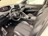 the interior of a car with a steering wheel and dashboard controls