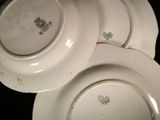 three plates that are sitting on top of each other