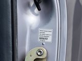 a close up of a metal door handle on a car