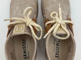 a close up of a pair of shoes with laces on them