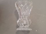 a glass vase that is sitting on a table