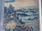 une image d'un tableau sur le mur d'une pièce